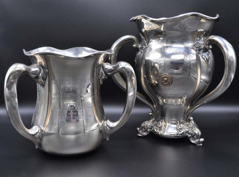 Two vintage silver trophies on display at the MHHNA