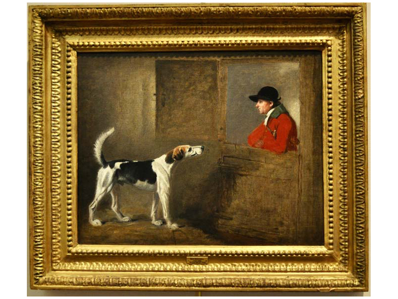 Gold framed oil painting of a foxhound and a foxhunter looking at each other through a barn stall door