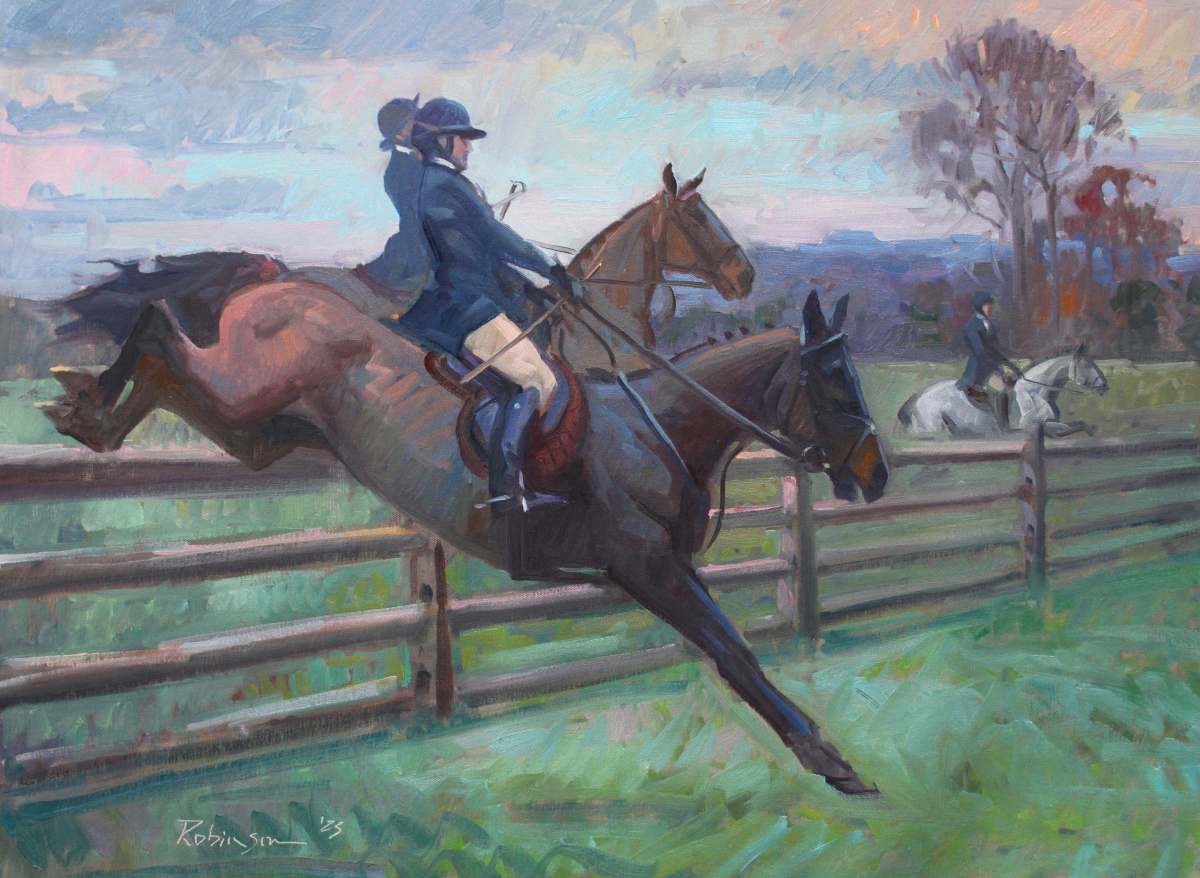 Two hunt riders jumping horses over fence