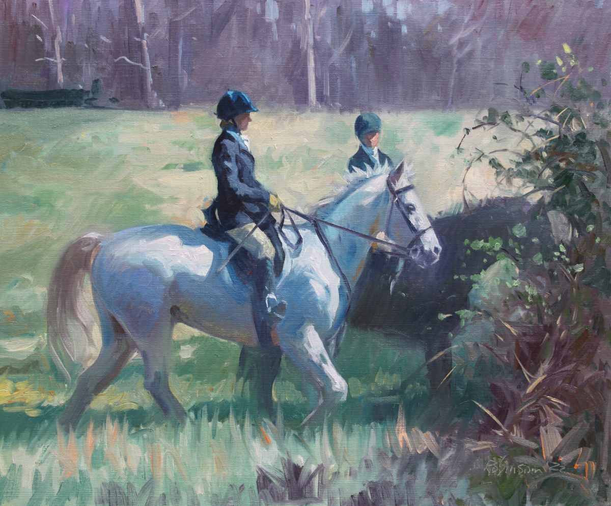 Two hunt riders walking horses in field