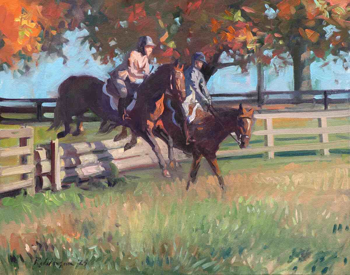Two riders jumping horses over stacked logs