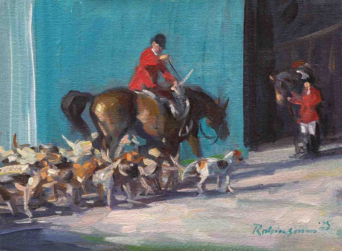 Huntsman mounting horse with pack of hounds surrounding