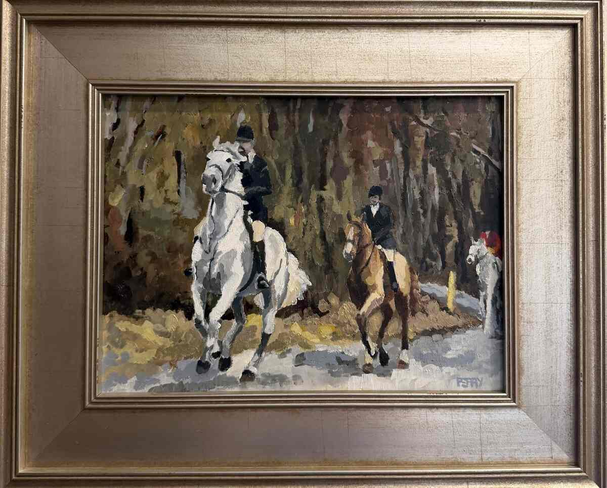Two riders cantering on path